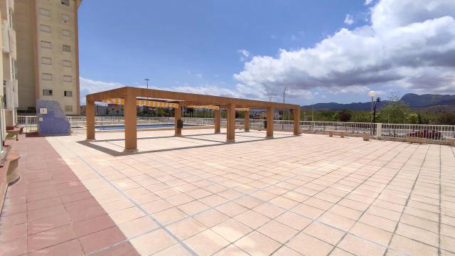 Imagen 4 de Apartment in Gandía beach, with views of the mountains and tree-lined boulevard.